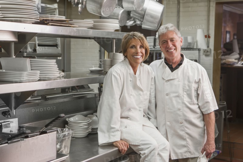 Caucasian chefs in commercial kitchen
