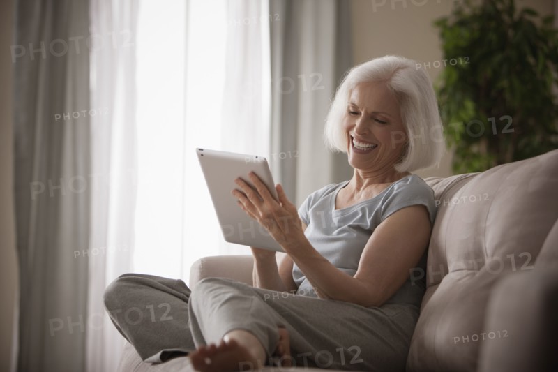 Caucasian woman using digital tablet