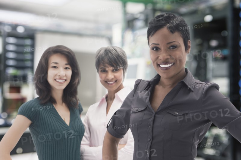 Businesswomen standing in server room