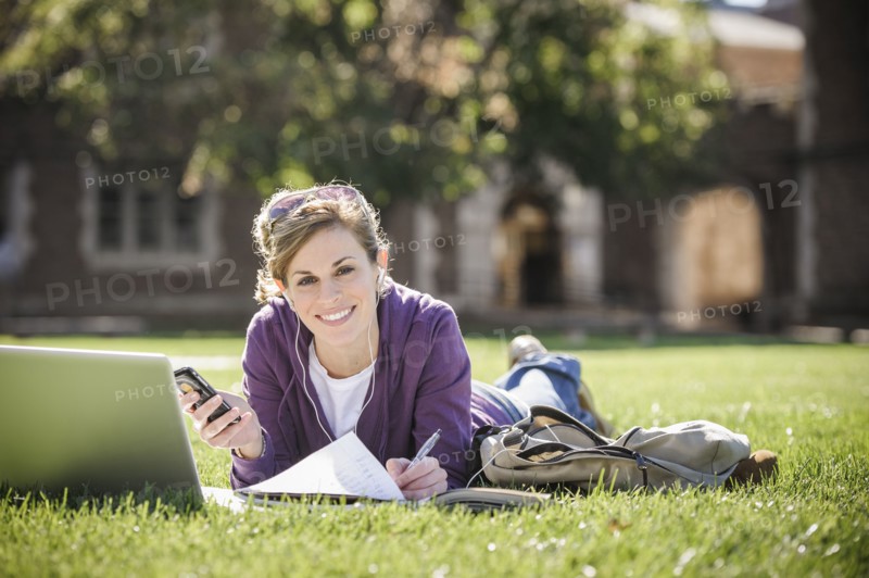 Caucasian student studying on campus