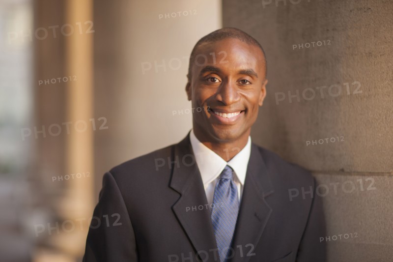 Black businessman smiling