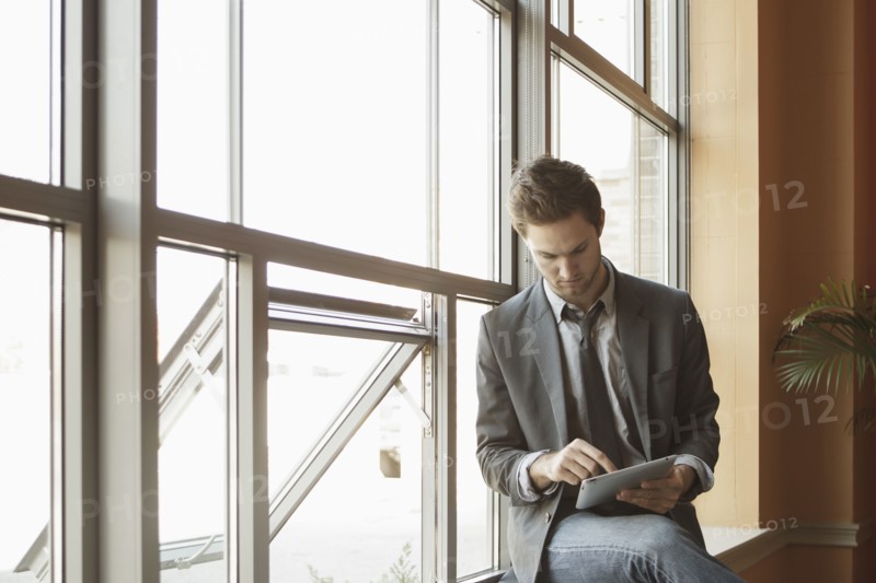 Businessman using tablet computer