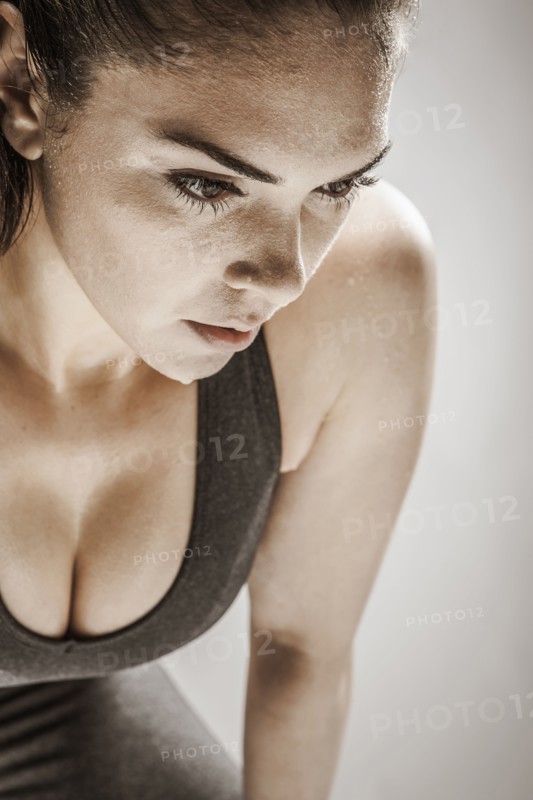 Caucasian woman resting after workout