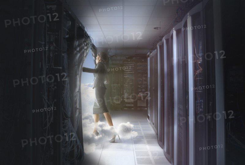 African American businesswoman walking into clouds