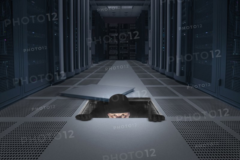 Caucasian man climbing into air vent