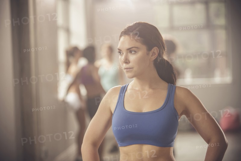 Woman standing in gym