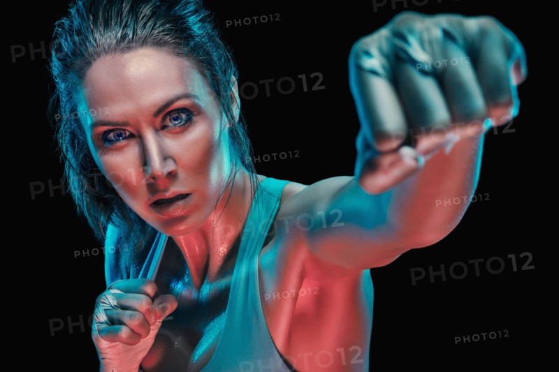 Caucasian boxer in fighting stance