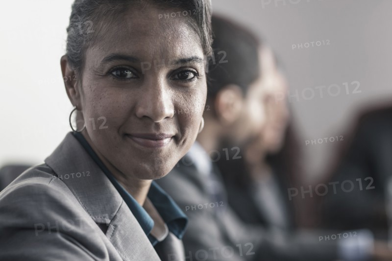 Businesswoman smiling in meeting