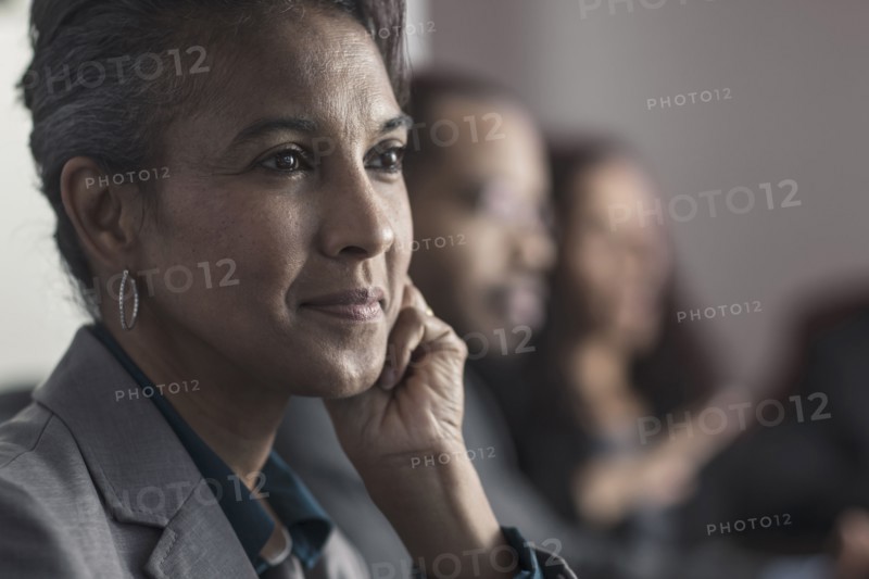 Businesswoman smiling in meeting