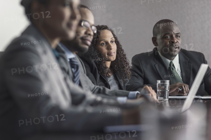 Business people talking in meeting