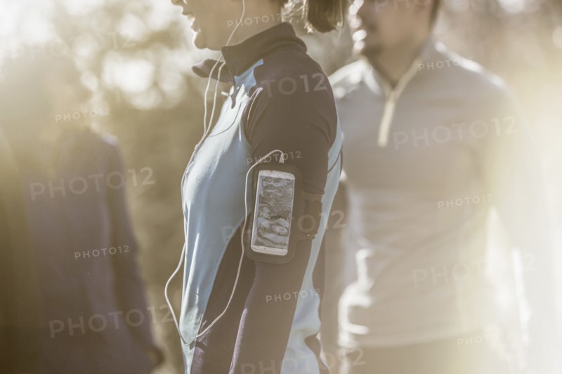 Close up of runner wearing mp3 player
