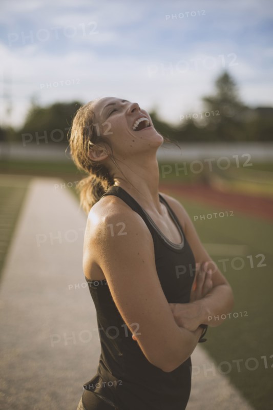 Caucasian athlete standing on sports field