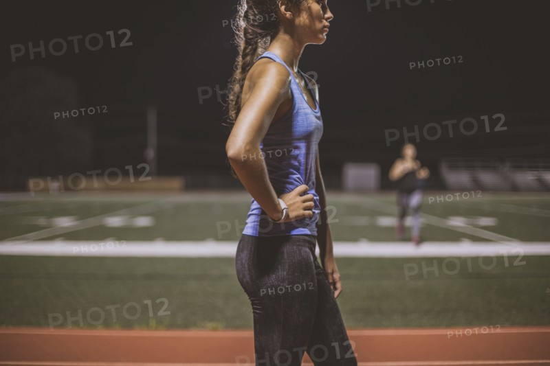 Athlete resting on sports field
