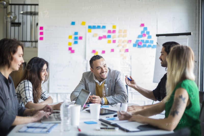 Business people talking in office meeting