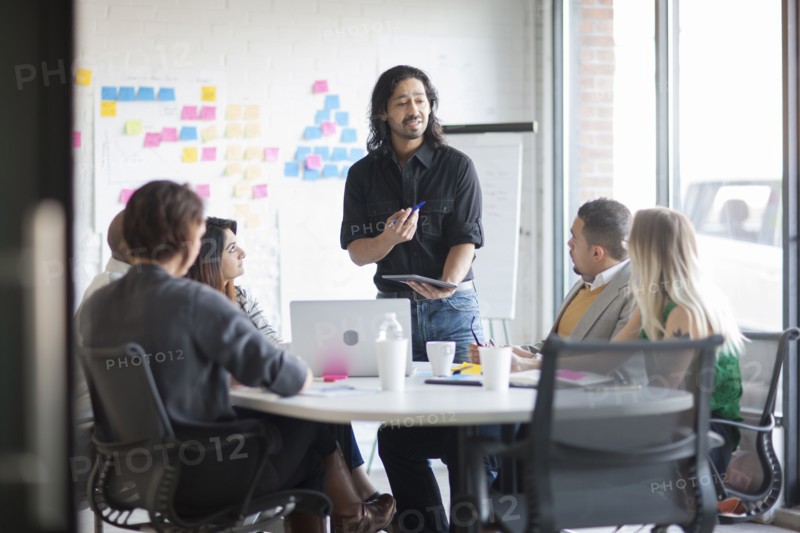 Business people talking in office meeting