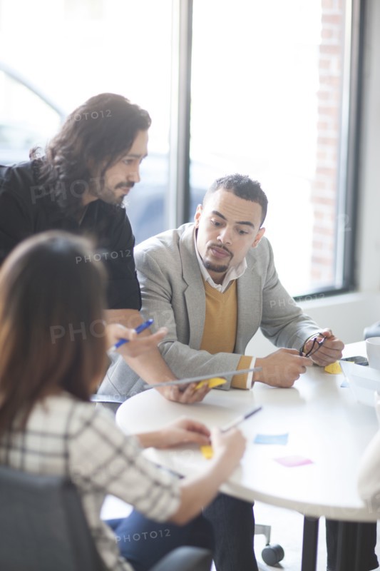 Business people talking in office meeting
