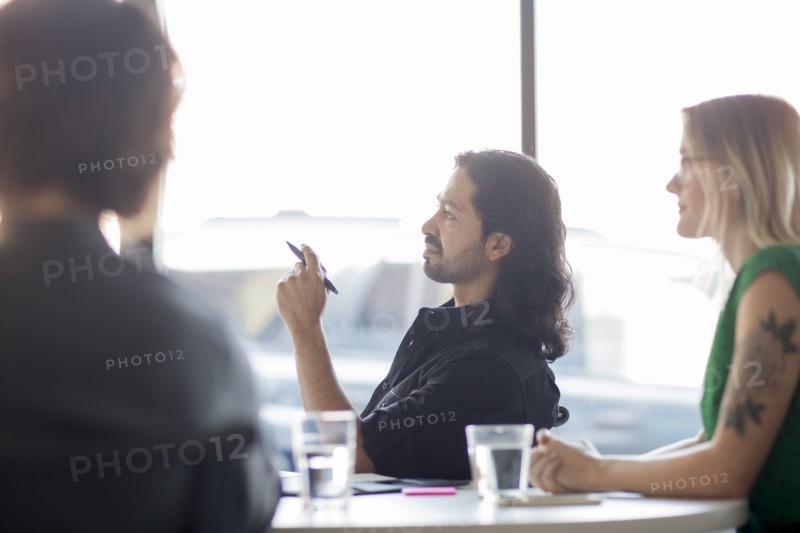 Business people talking in office meeting