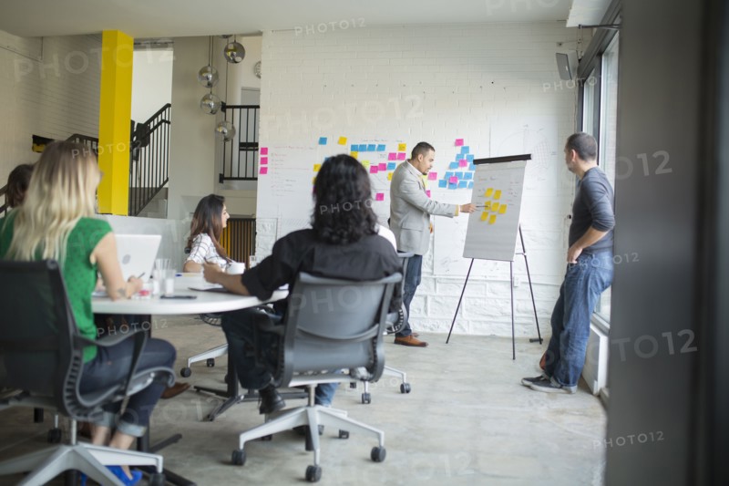 Business people talking in office meeting