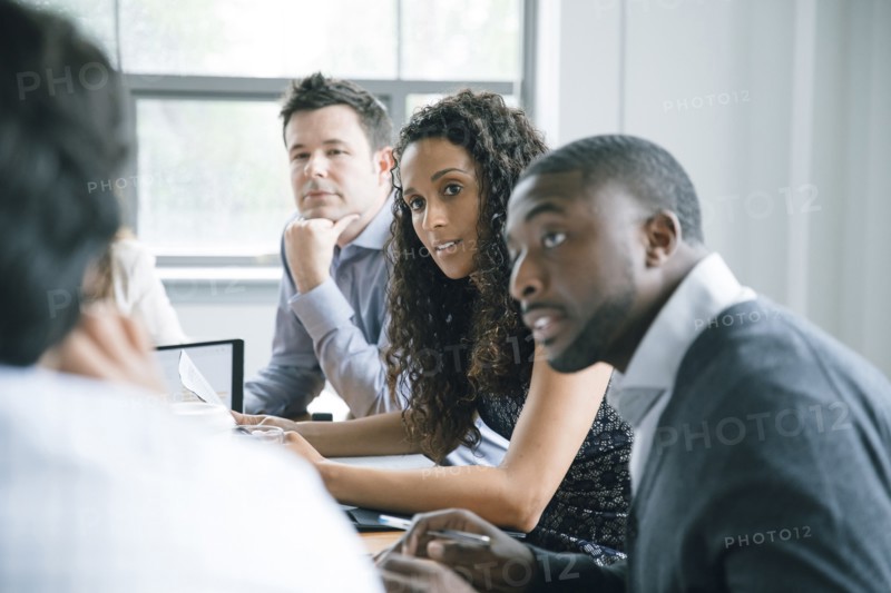 Business people listening in meeting
