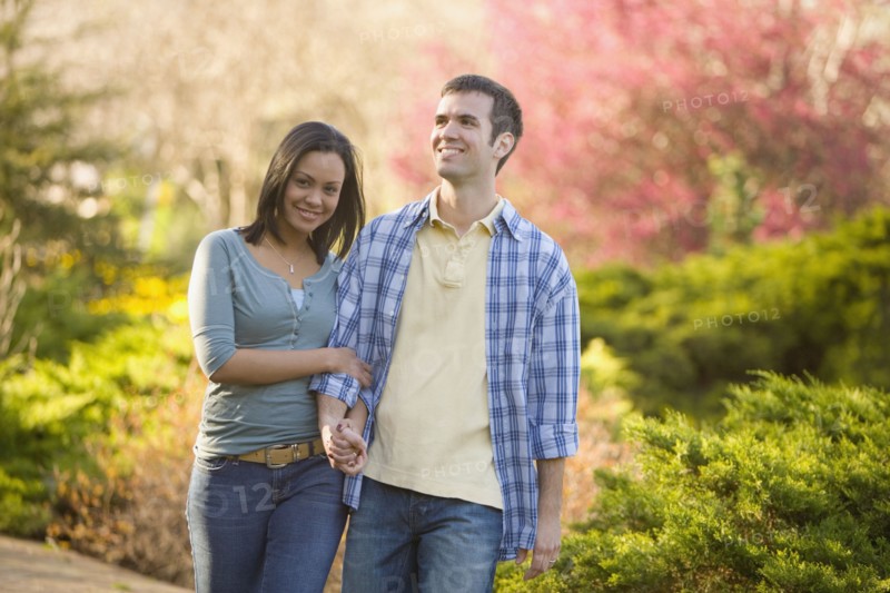 Hispanic couple holding hands