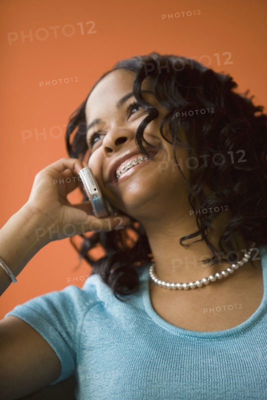 African woman talking on cell phone
