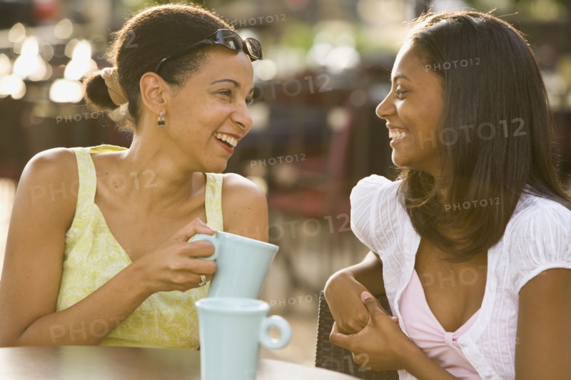 African mother and daughter laughing