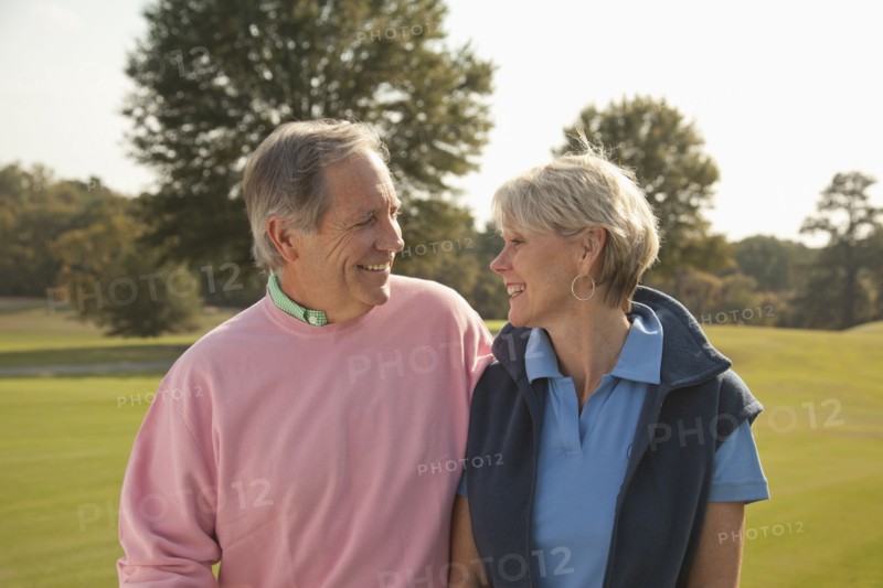 Couple standing together outdoors