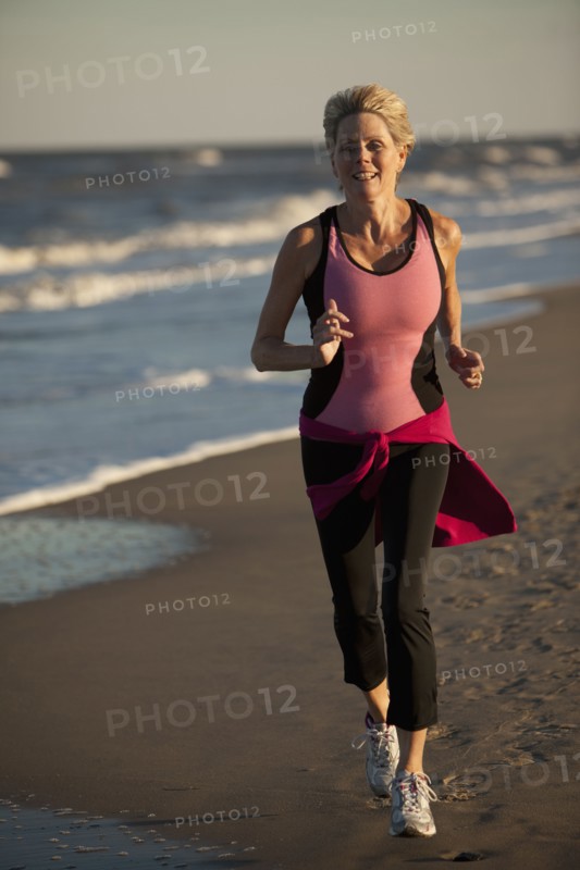 Woman running on beach