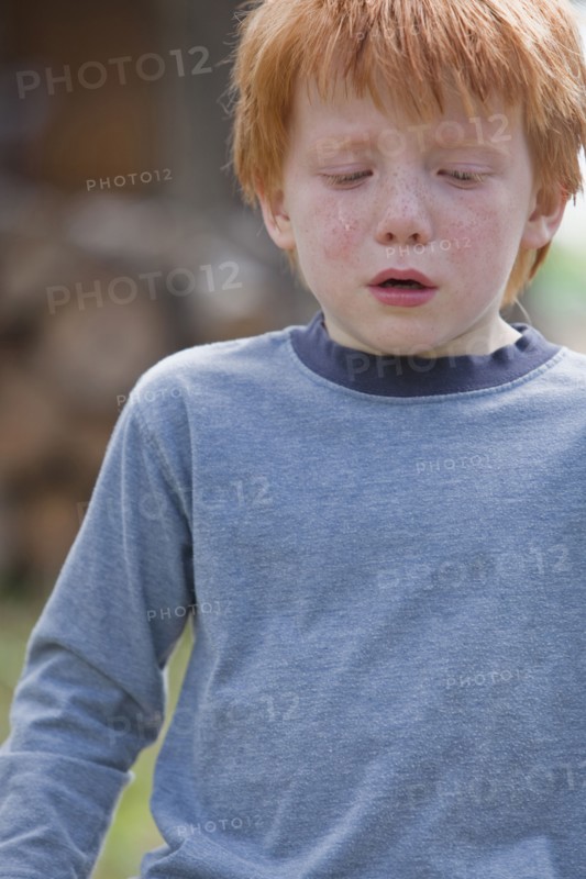 Caucasian boy crying