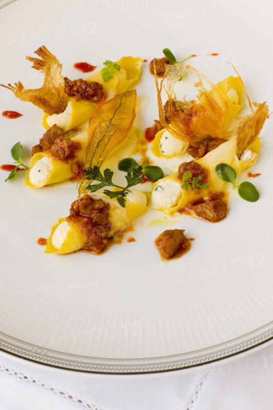 Italian cheese cannelloni with sauce