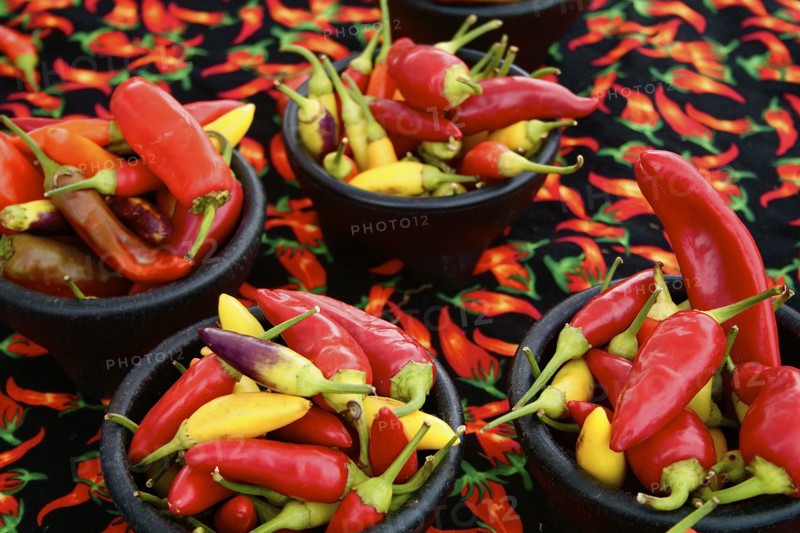 Bowls of yellow and red peppers