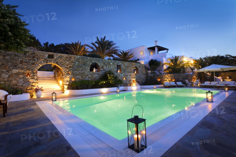Illuminated swimming pool at night