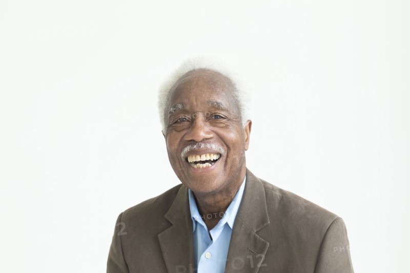Portrait of laughing older Black man