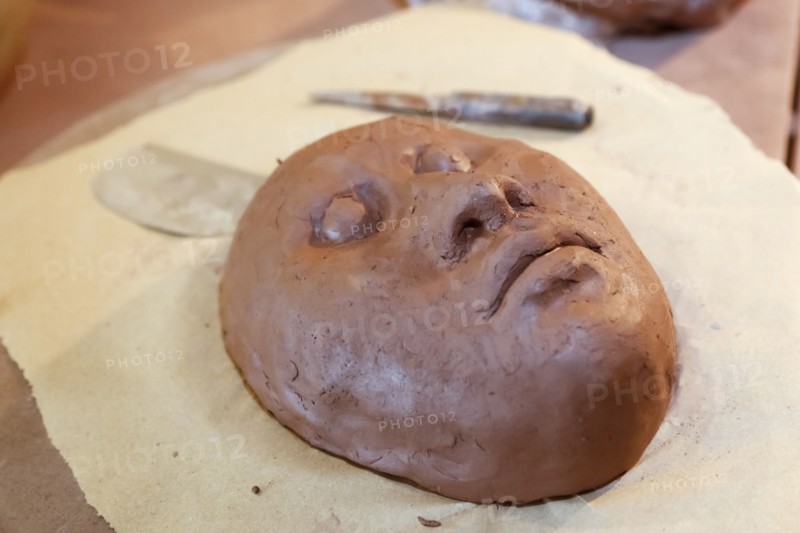 Clay mask in art studio