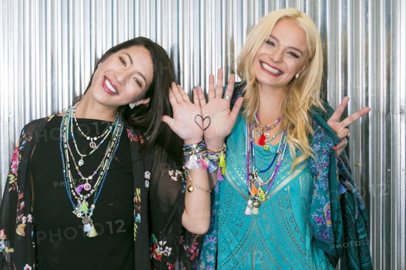 Women showing heart on hands