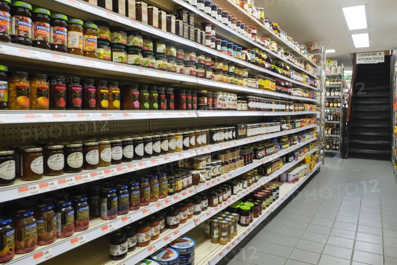 jars of food in supermarket aisle