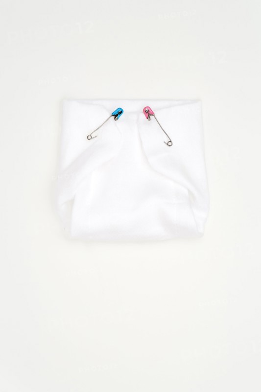 Old-fashioned pins in cloth diaper