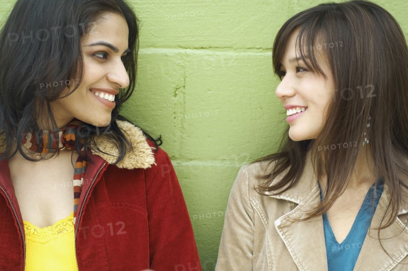 Young women looking at each other
