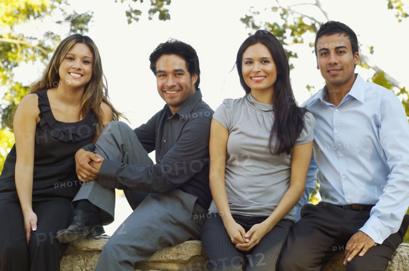 Hispanic business people posing outdoors