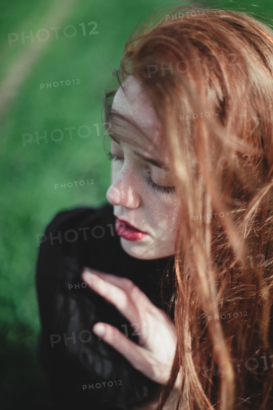Pensive Caucasian woman