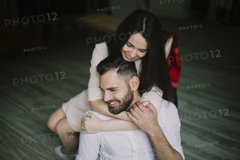 Caucasian couple hugging