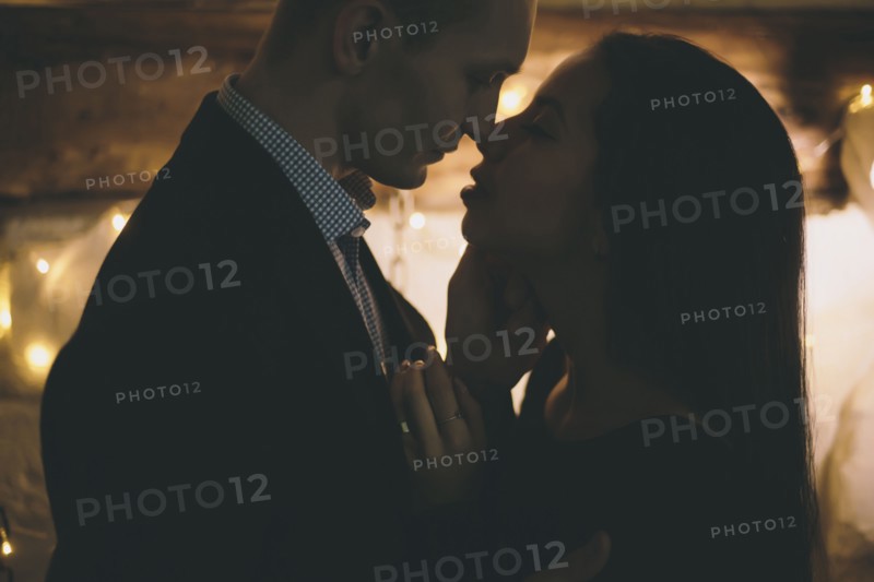 Caucasian couple rubbing noses
