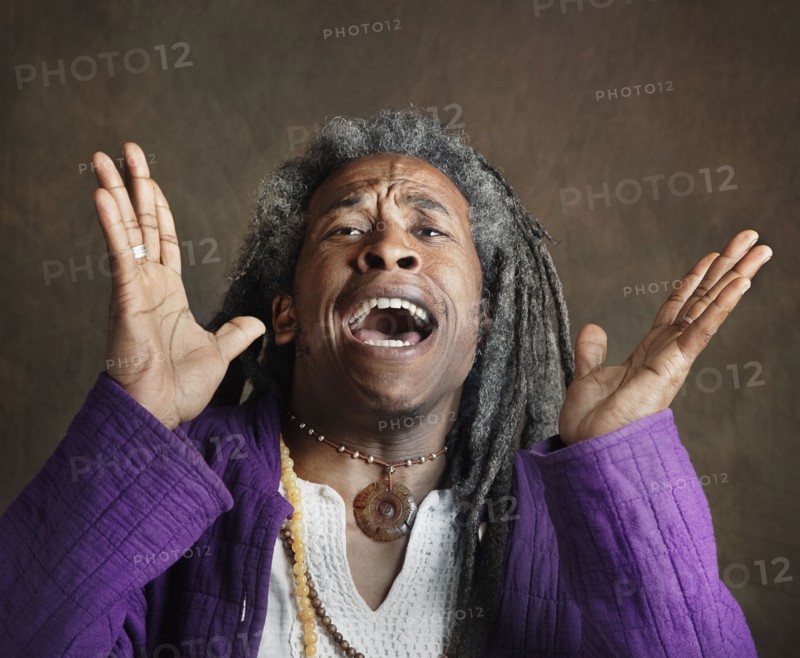 Exuberant African man with dreadlocks