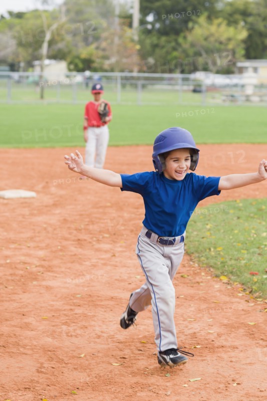 Hispanic boys playing baseball