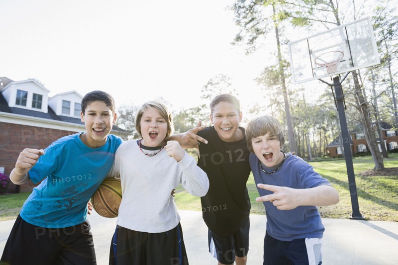 Boys playing basketball