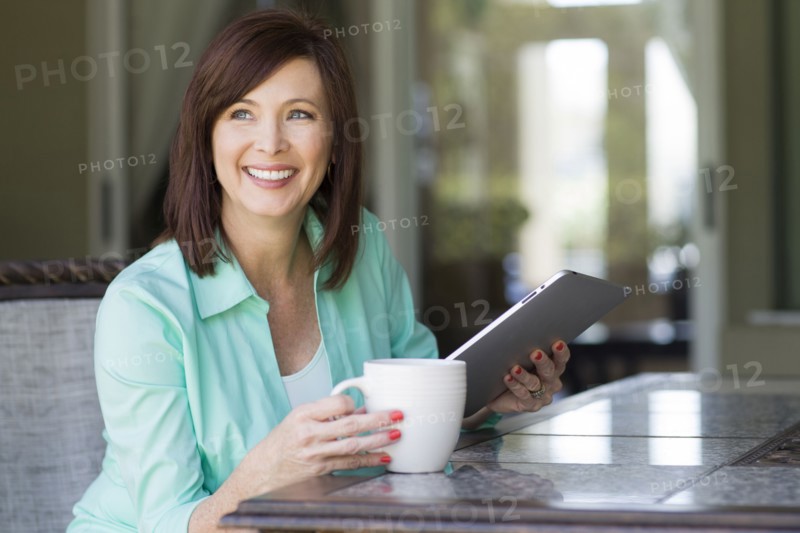 Caucasian woman using digital tablet