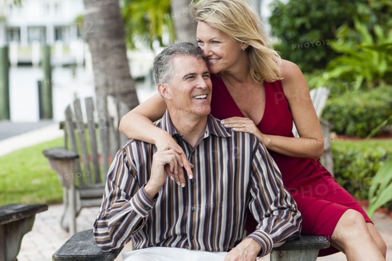 Caucasian couple hugging outdoors