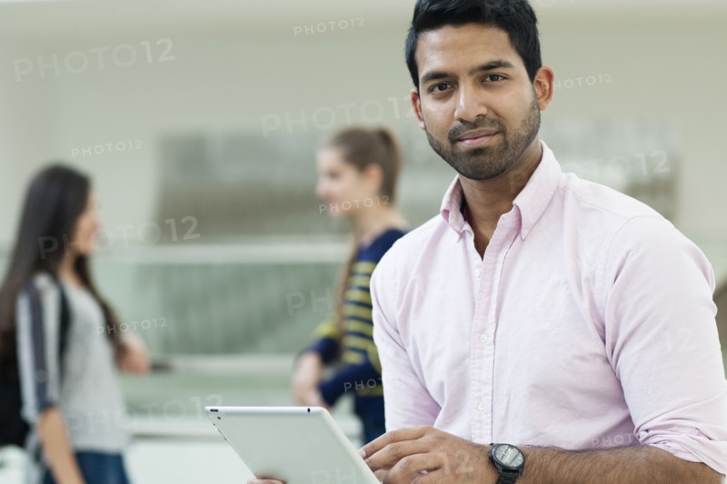 Man using digital tablet
