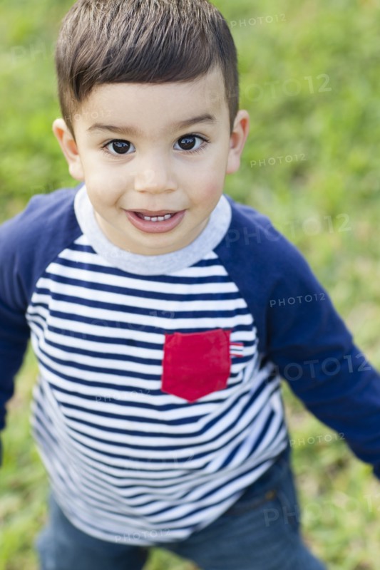 Close up of Hispanic boy outdoors