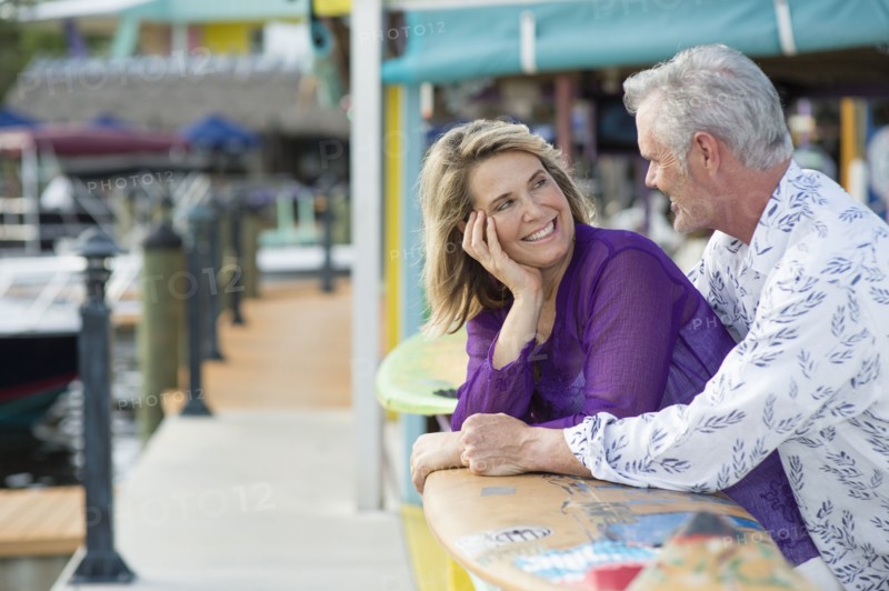 Older Caucasian couple smiling outdoors